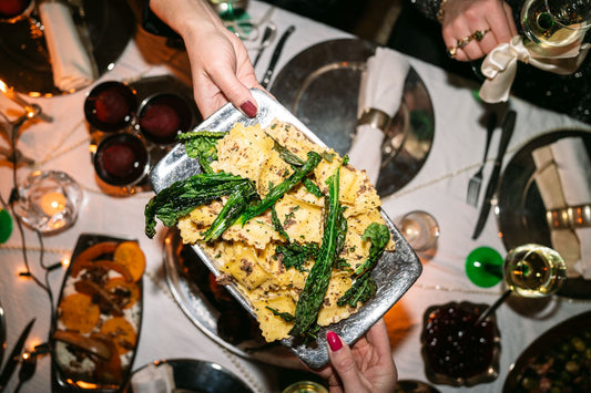 Truffelravioli, cavalo nero, paddenstoeltjes en burrata